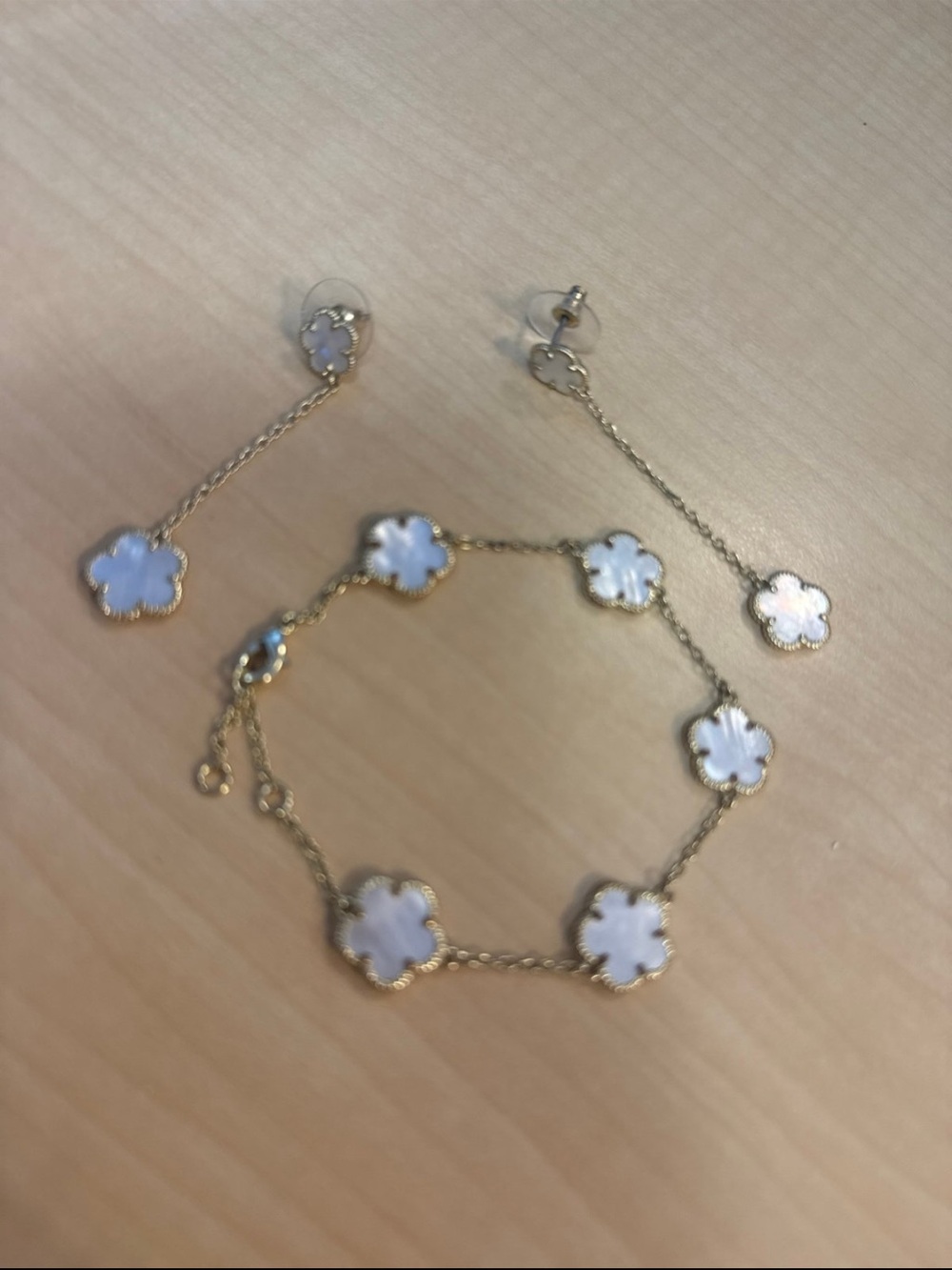 Gold-Tone Bracelet with White Clover Charm Accents